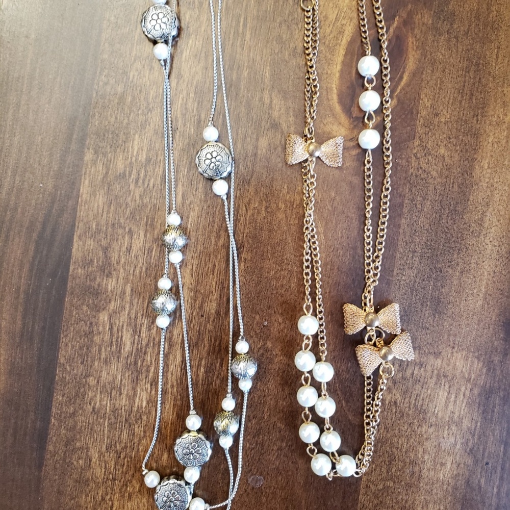 Long silver and gold colored 1920’s inspired necklaces
